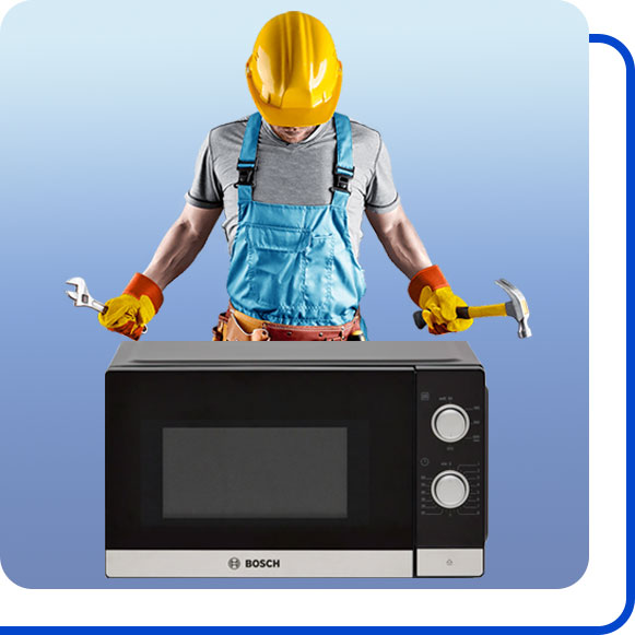 repairing-bosch-microwave تعمیرکار در کنار مایکروفر بوش ایستاده است